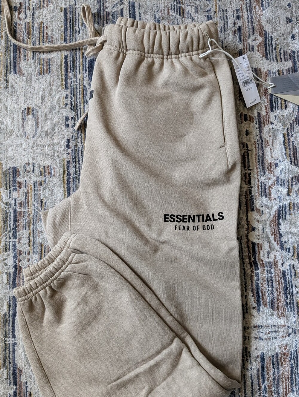 Fear of God ESSENTIALS fleece sweatpants in Desert Sand, size XS.